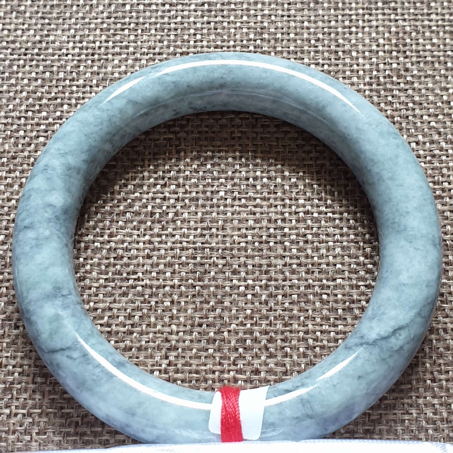 56mm Ash Grey Type A Jadeite Jade Bangle (乌鸡翡翠圆条手镯) BGL76763