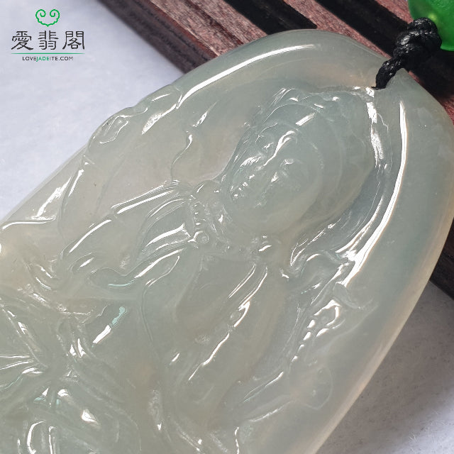Close-up of Guan Yin jadeite carving showing texture and translucency