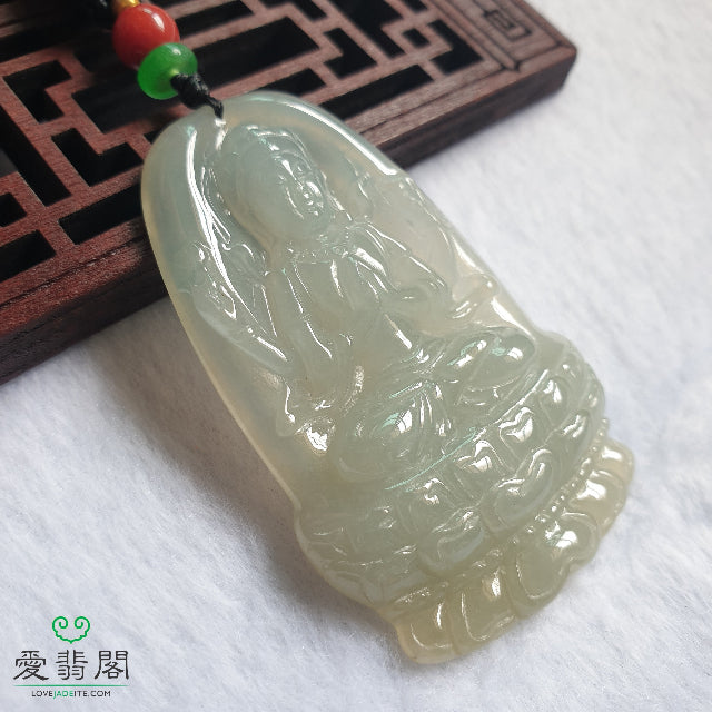 Close-up of Guan Yin jadeite carving showing texture and translucency